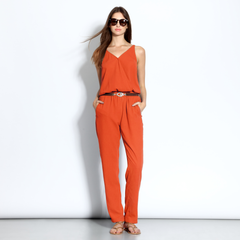 v-necked jumpsuit with faux leather belt in crimson orange