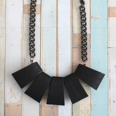 Metal chain and chunky wood necklace in black