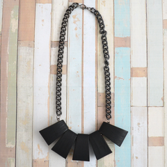 Metal chain and chunky wood necklace in black