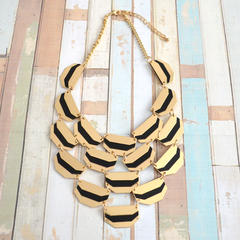 Geometric gold-tone and black cascading necklace
