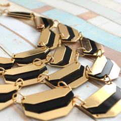 Geometric gold-tone and black cascading necklace