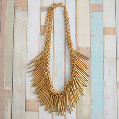Gold-tone chain necklace with drop bar pendants
