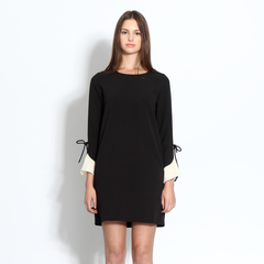 Shift dress with ruffle cuffs in black and cream